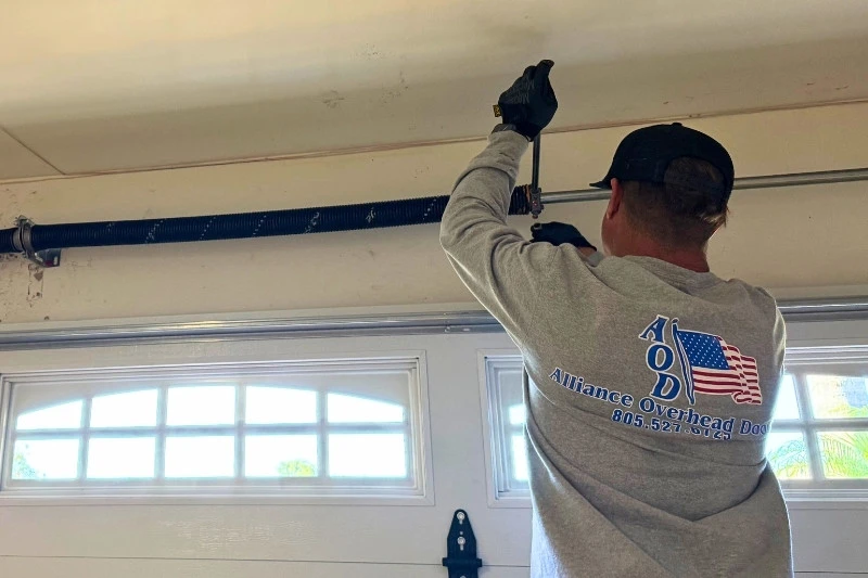 Torsion Spring Repair by Employee